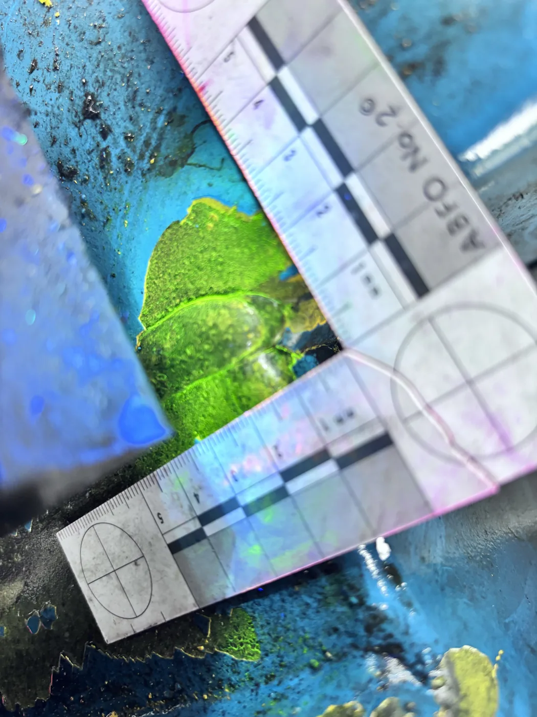 Fluoreszierende Magnetpulverprüfung